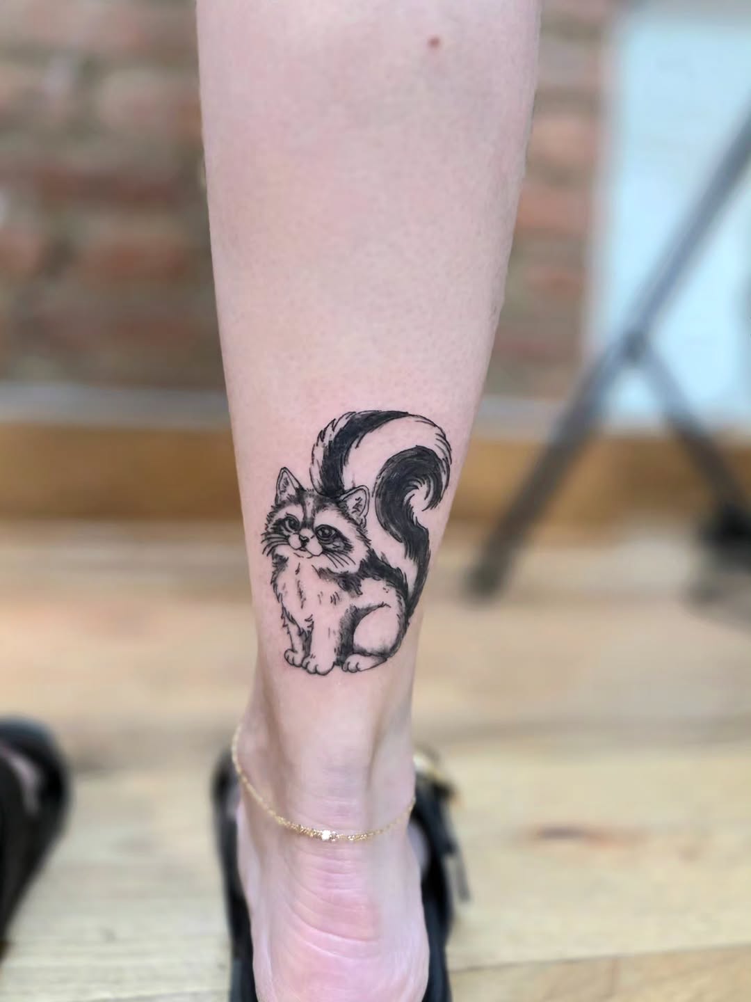 Raccoon realism tattoo on the calf by Courtney, Lakewood, Ohio