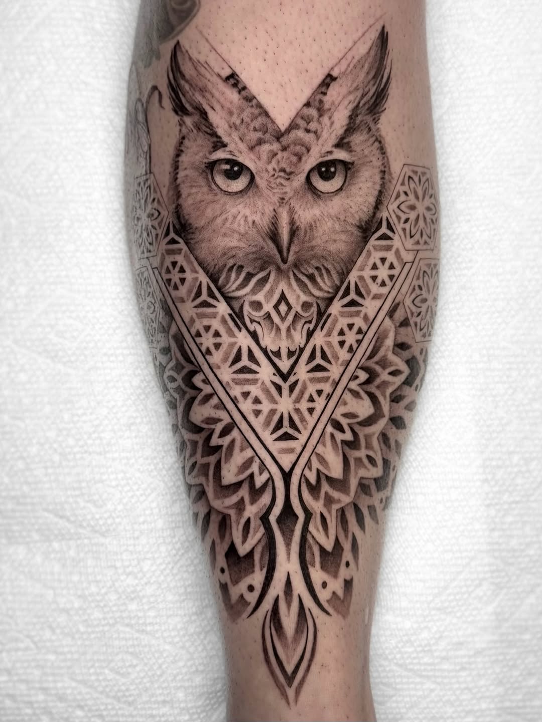 Tattoo by @jaxntheboxtattoos — realism, geometric