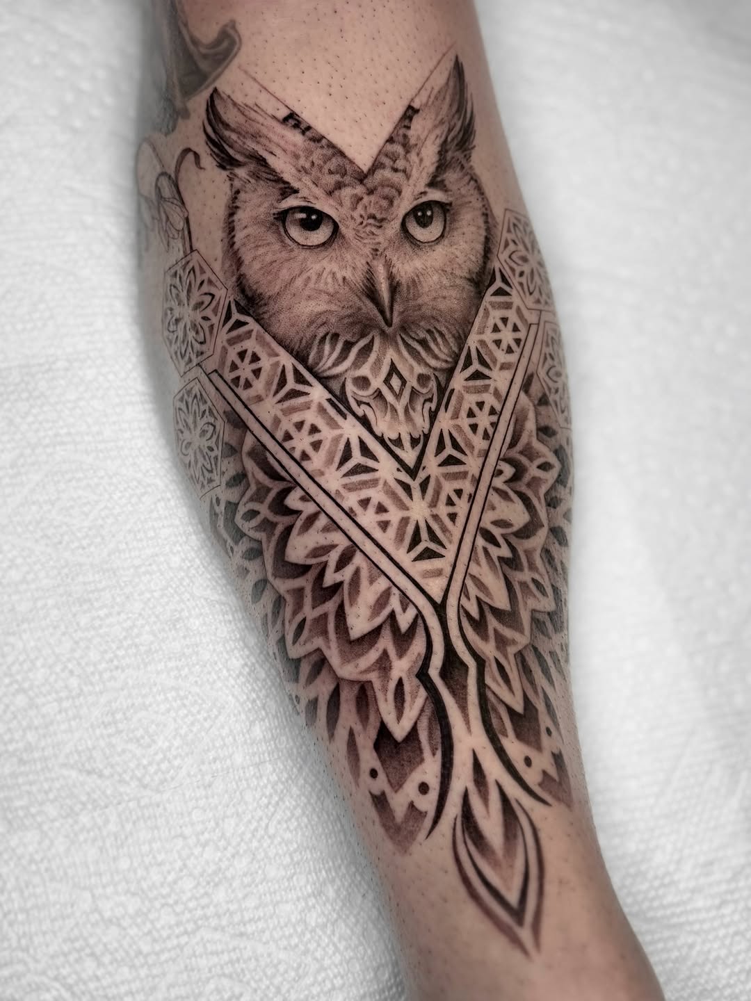 Tattoo by @jaxntheboxtattoos — realism, geometric