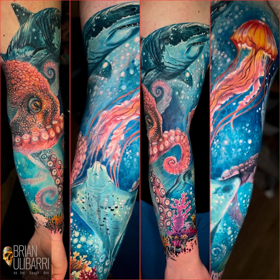 Surrealism tattoo on the upper arm by Brian Ulibarri