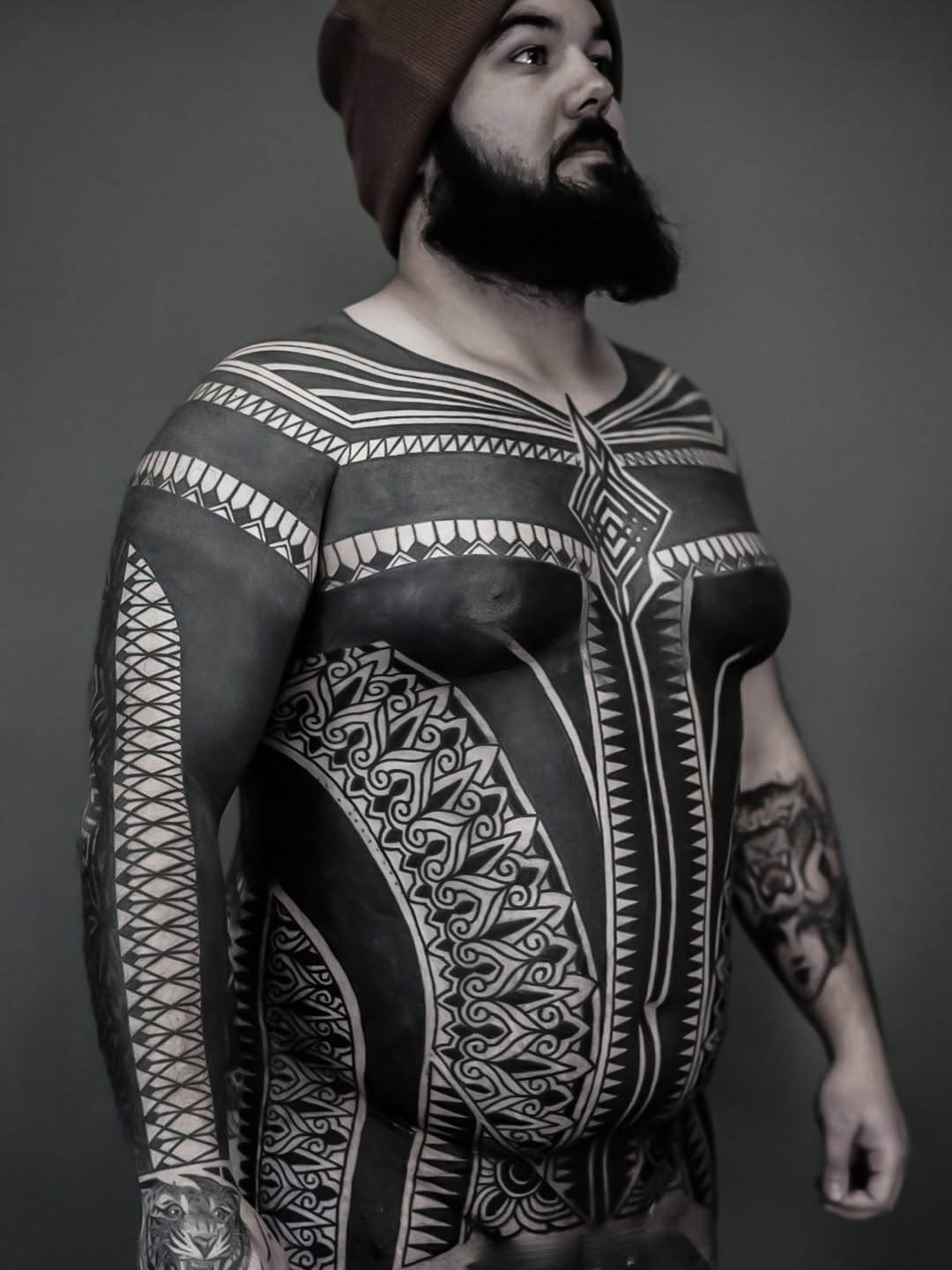 Full body tribal patterns tribal tattoo on the chest by Oliver kenton, San Diego, California