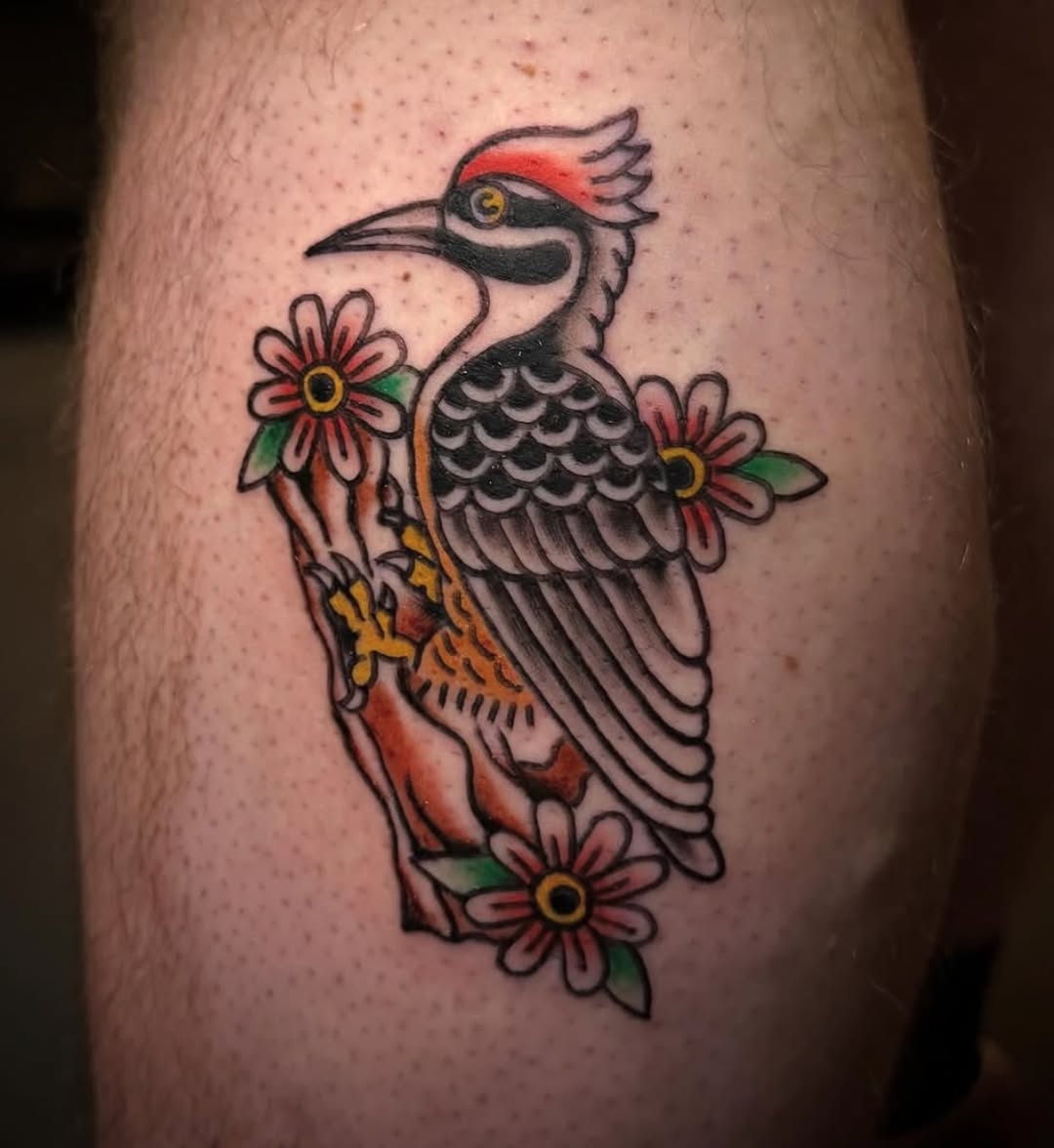 Woodpecker and flowers American traditional tattoo on the forearm by Tatts By Bryan B 🇲🇽 - SLC
