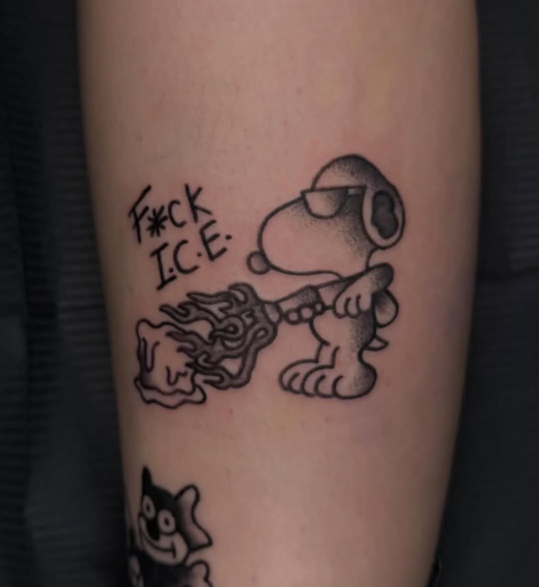 Snoopy with sunglasses and flames ignorant tattoo on the forearm by Tatts By Bryan B 🇲🇽 - SLC