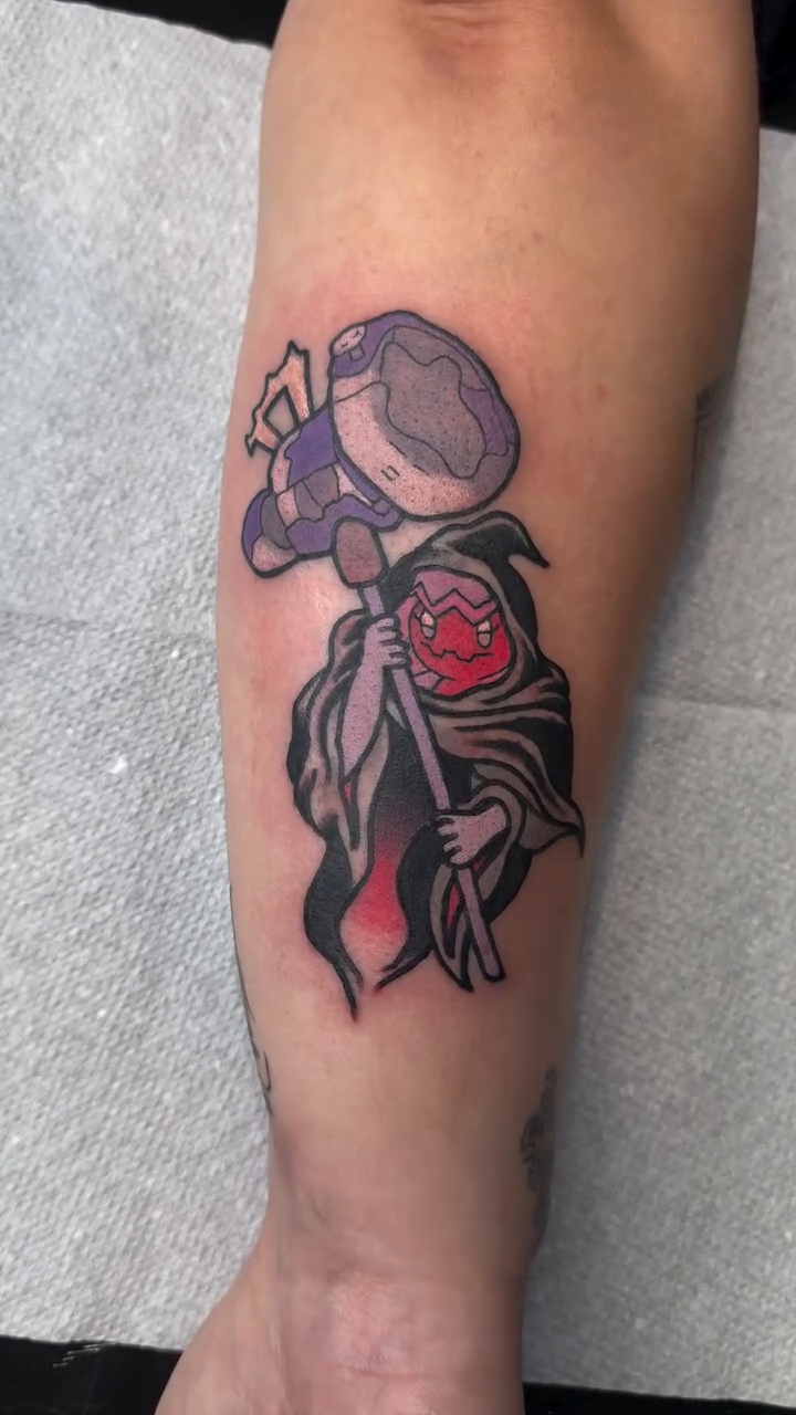 New school tattoo on the forearm by Mercy Dean