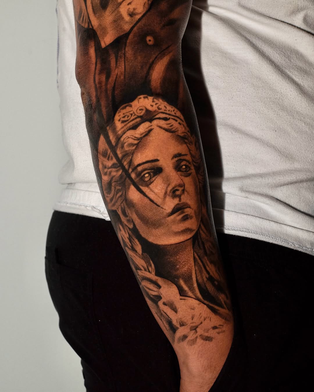 Tattoo by @javiink_rm — realism, black_and_grey