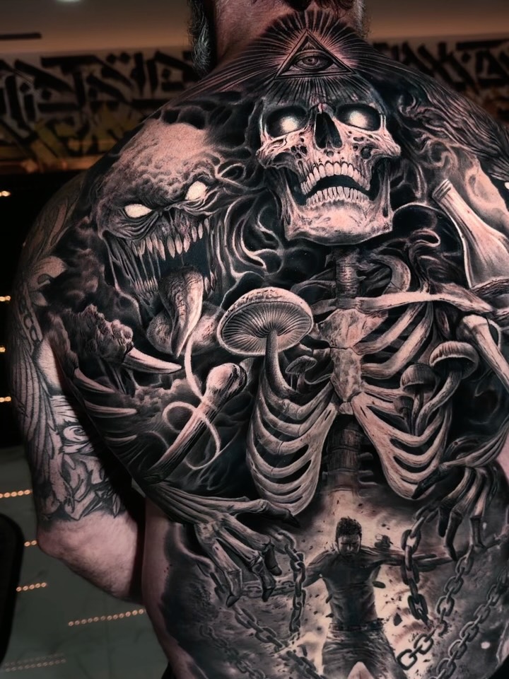Realism tattoo on the back by angel.antonio.tattoos