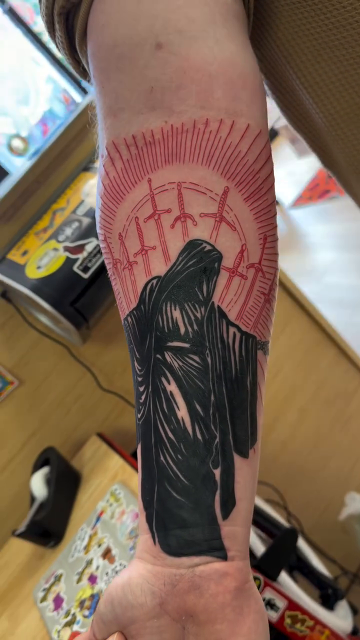 Grim Reaper with radiating sun dark art tattoo on the forearm by Stvn Geyer, Urbandale, Iowa