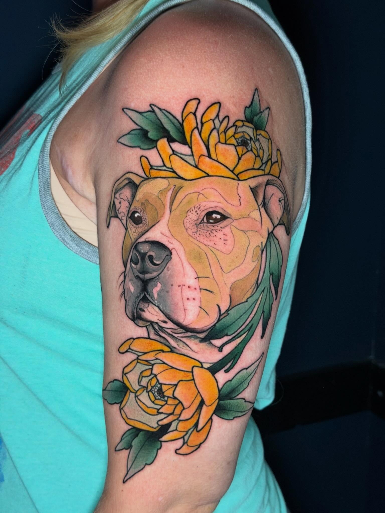 Pitbull with flowers realism tattoo on the upper arm by 𝐀𝐧𝐝𝐲 𝐁𝐚𝐠𝐥𝐞𝐲