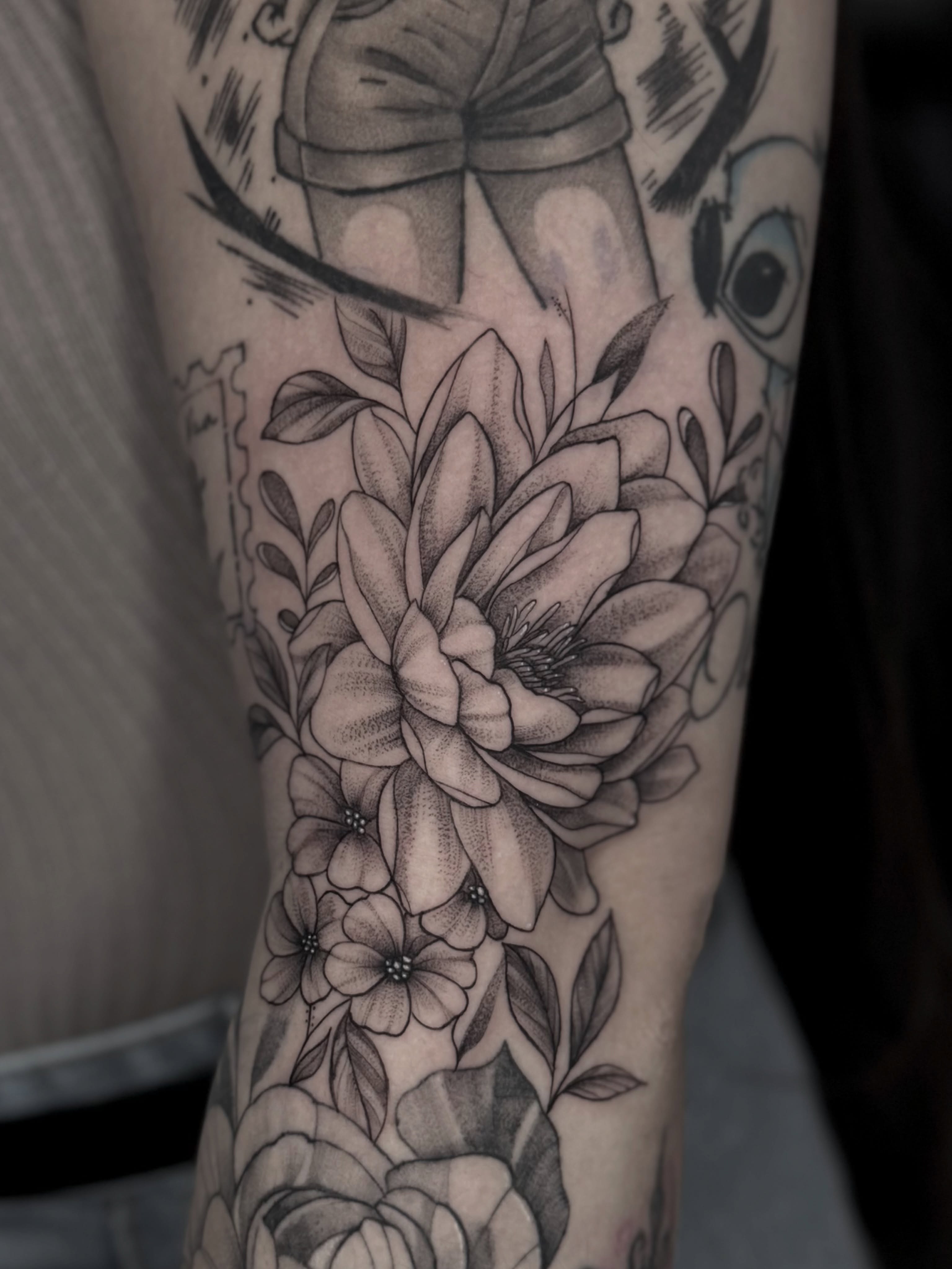 Floral arrangement dotwork tattoo on the forearm by Adri Chavez
