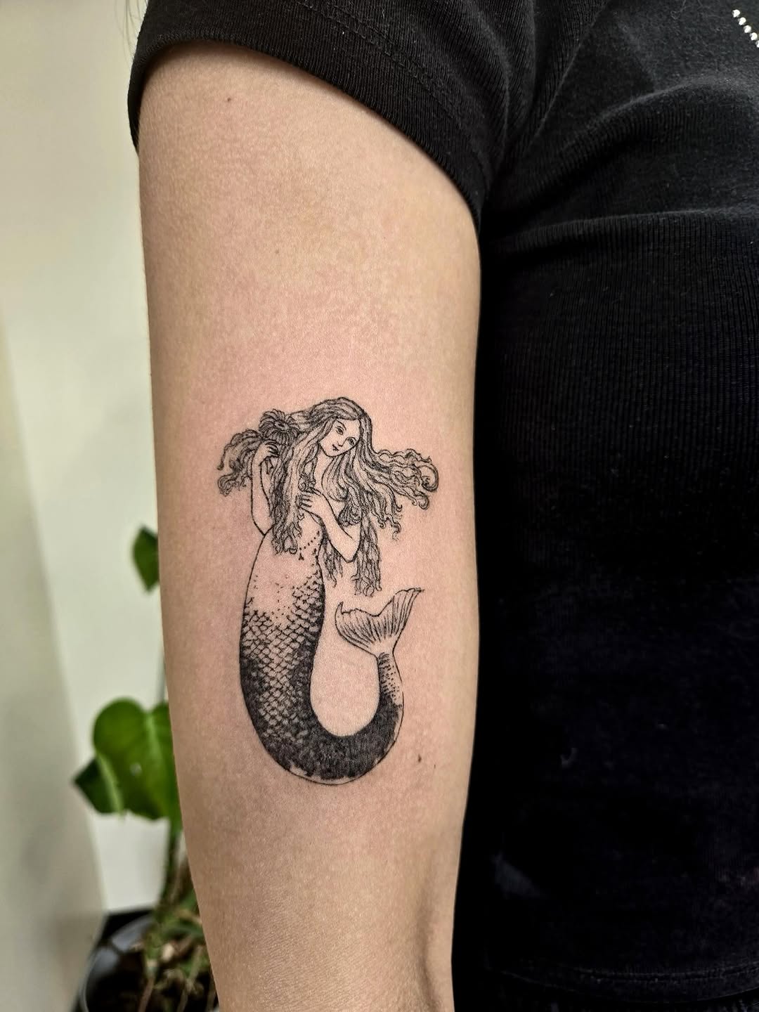 Mermaid fine line tattoo on the forearm by Vintage tattoo