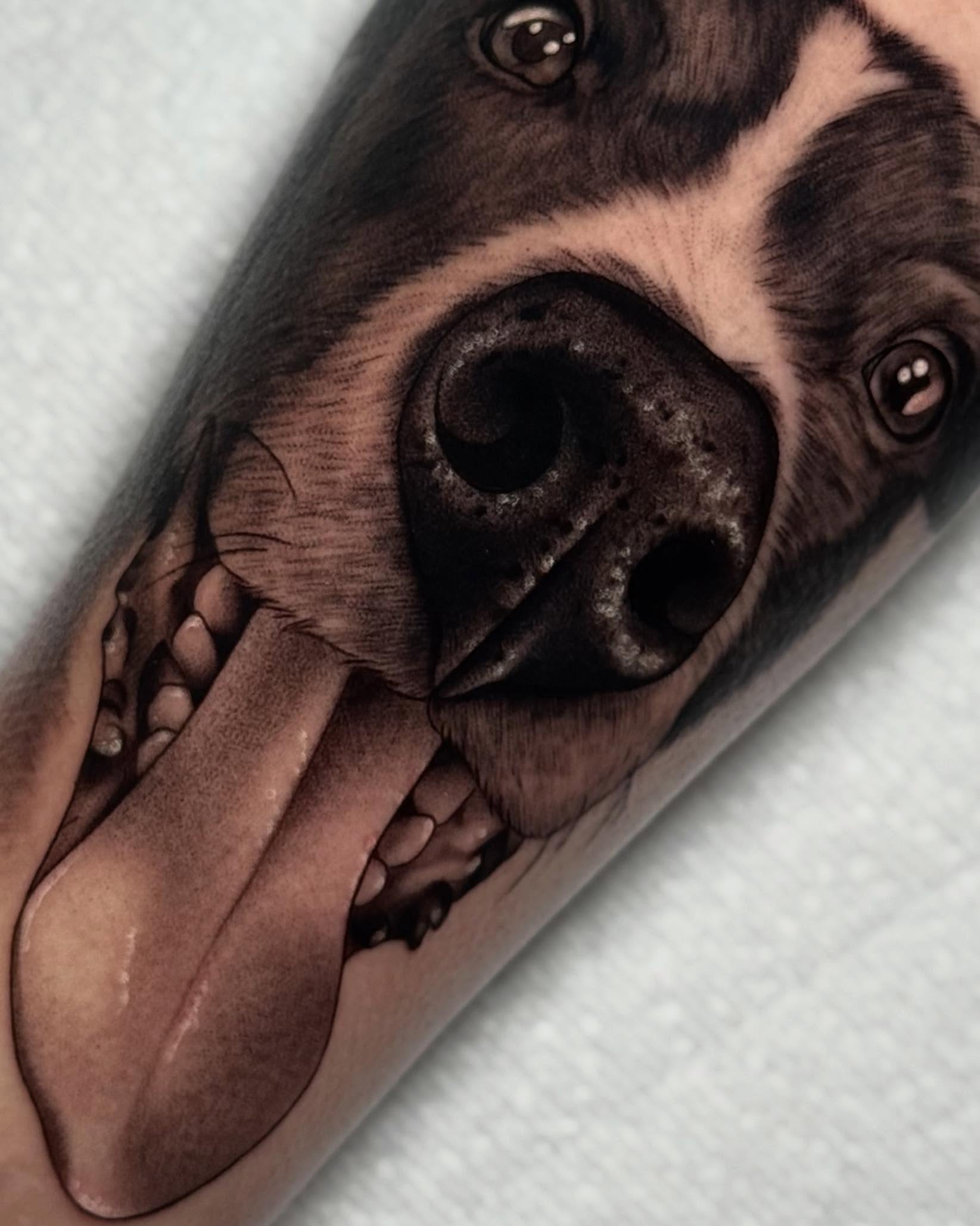 Dog portrait realism tattoo on the forearm by Bell Bolton