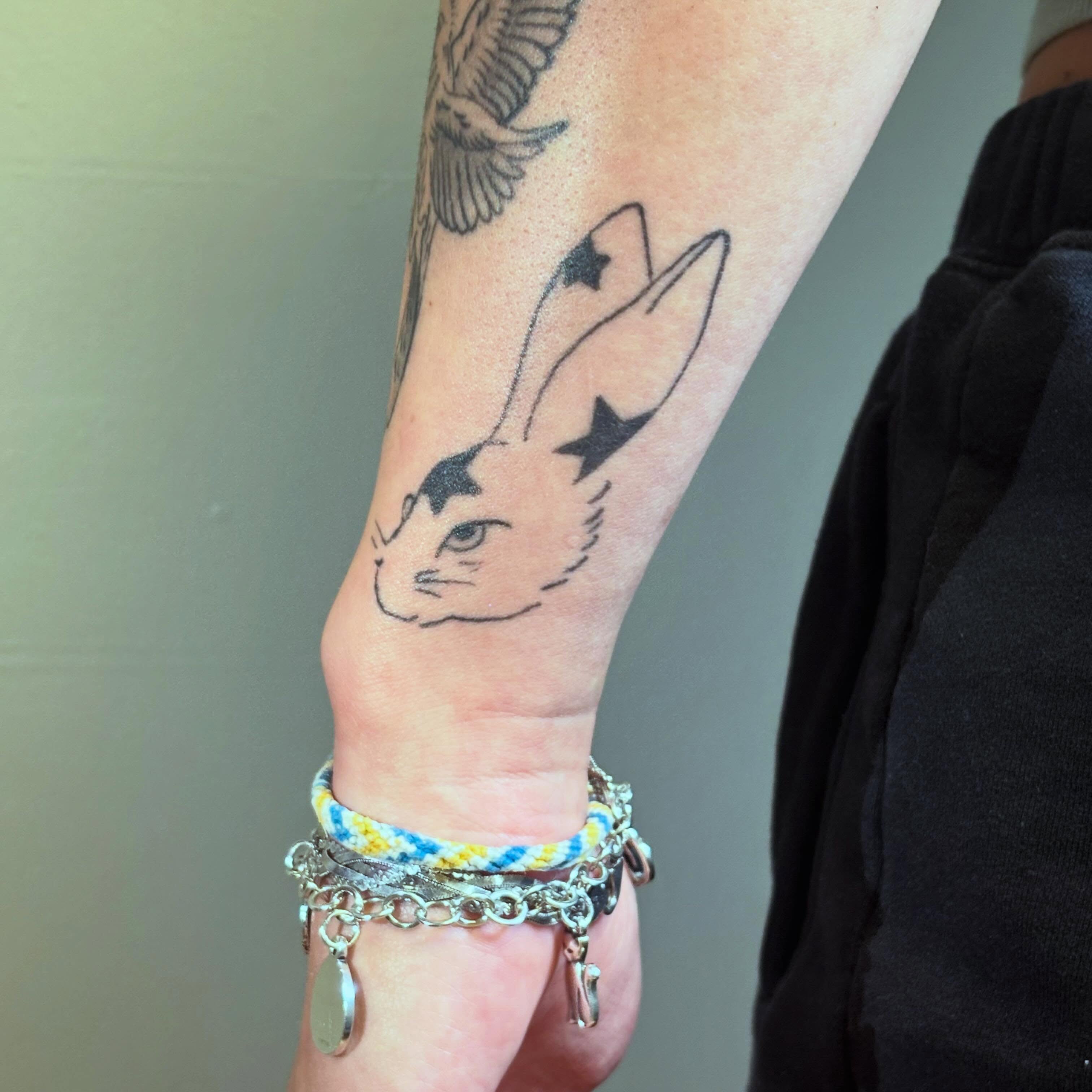 Rabbit black and grey tattoo on the forearm by Natalie Jade Shupe