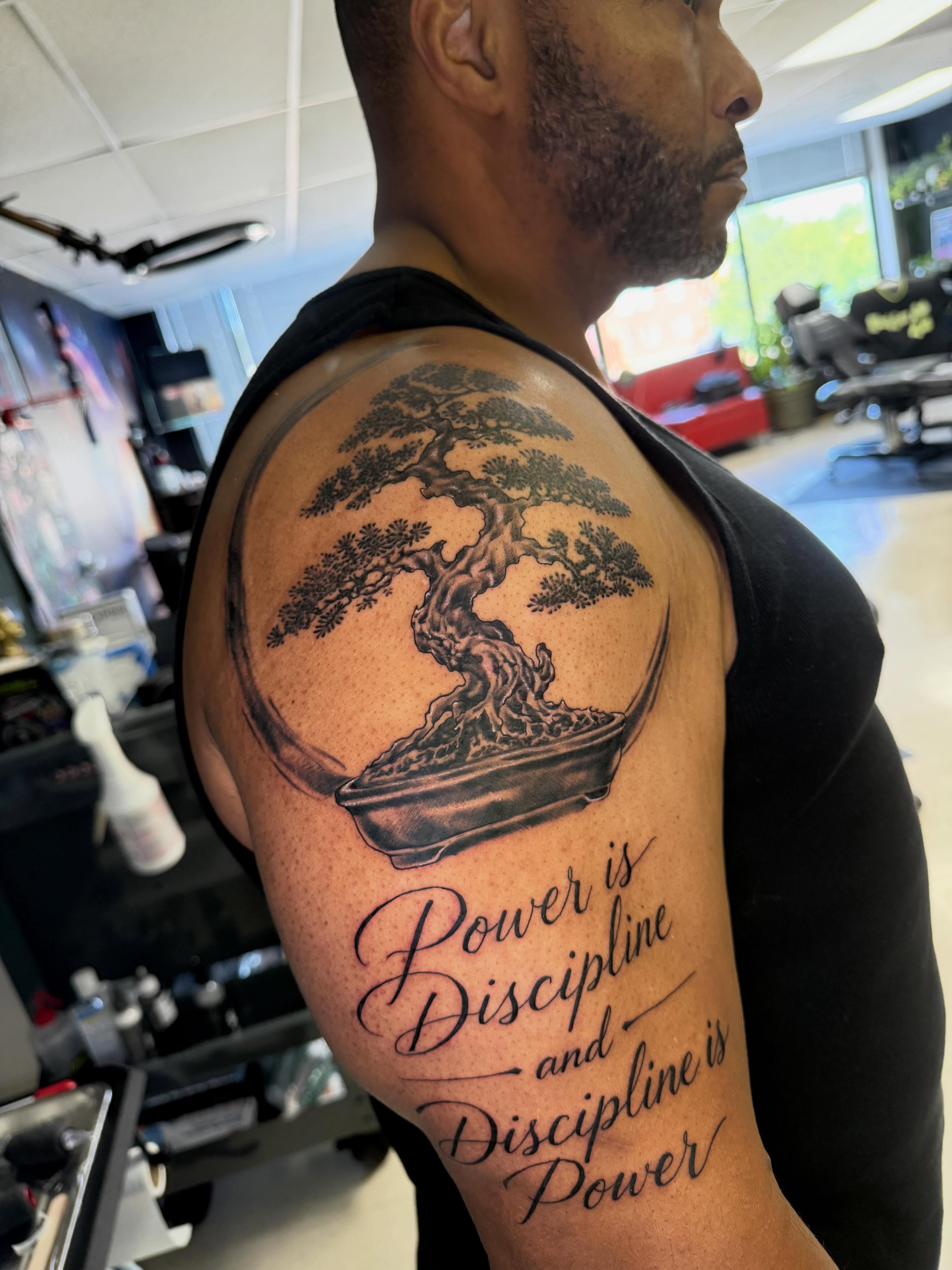 Bonsai tree black and grey tattoo on the shoulder by Steve - Tattoo Artist