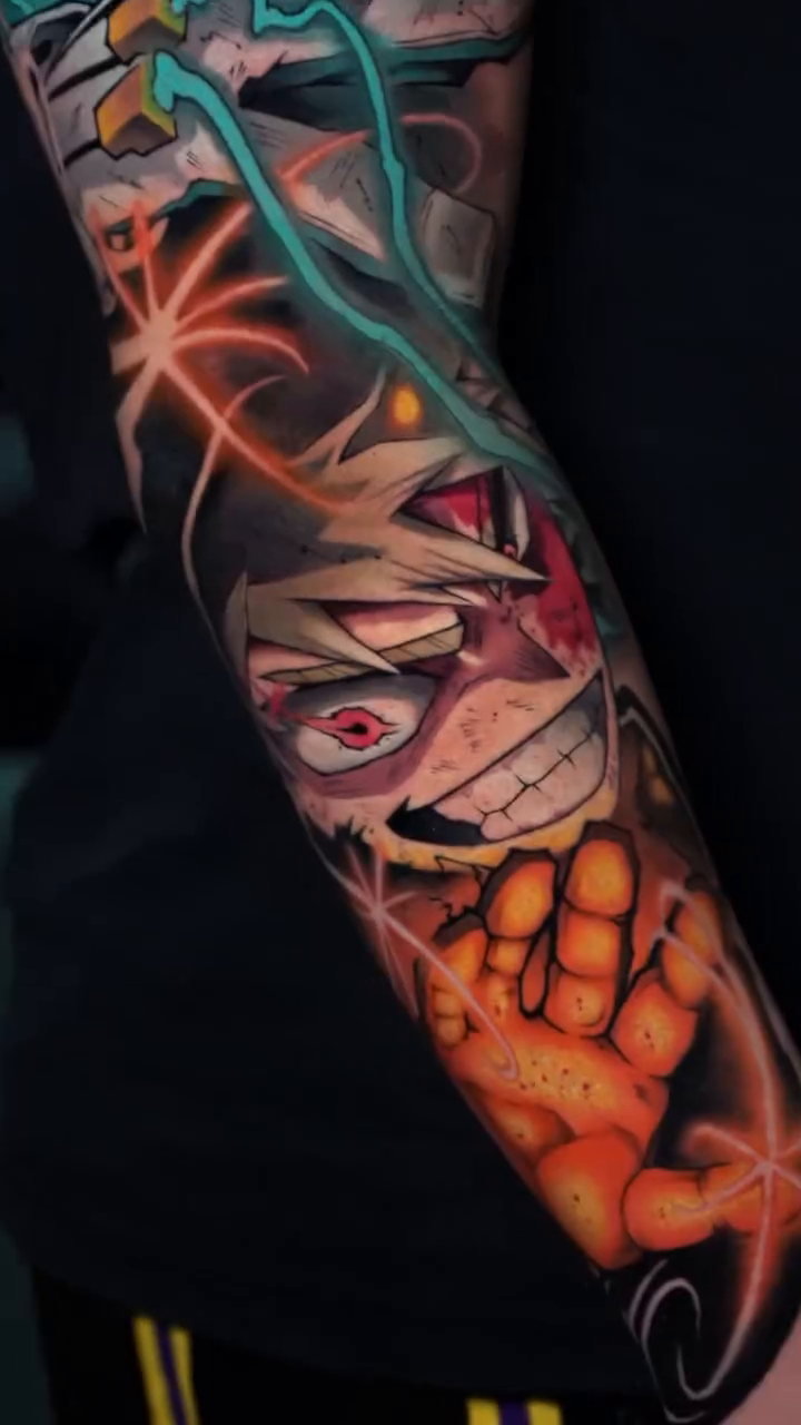 Anime character with a hand anime tattoo on the forearm by Anime
