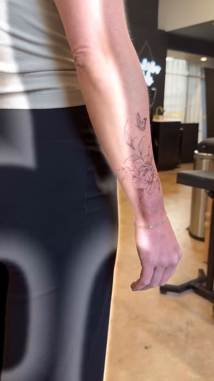 Floral vine tattoo on arm fine line tattoo on the forearm by Chanel Picquelle, Nashville, Tennessee