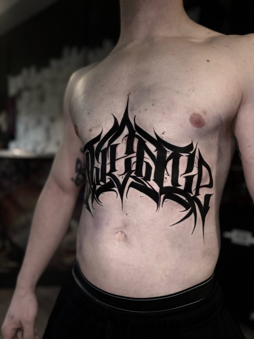 Tattoo by @wiseroner — lettering_script, blackwork