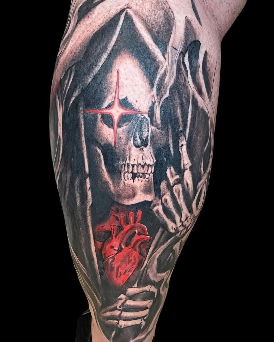 Grim reaper holding a heart realism tattoo on the forearm by Cody Glenn