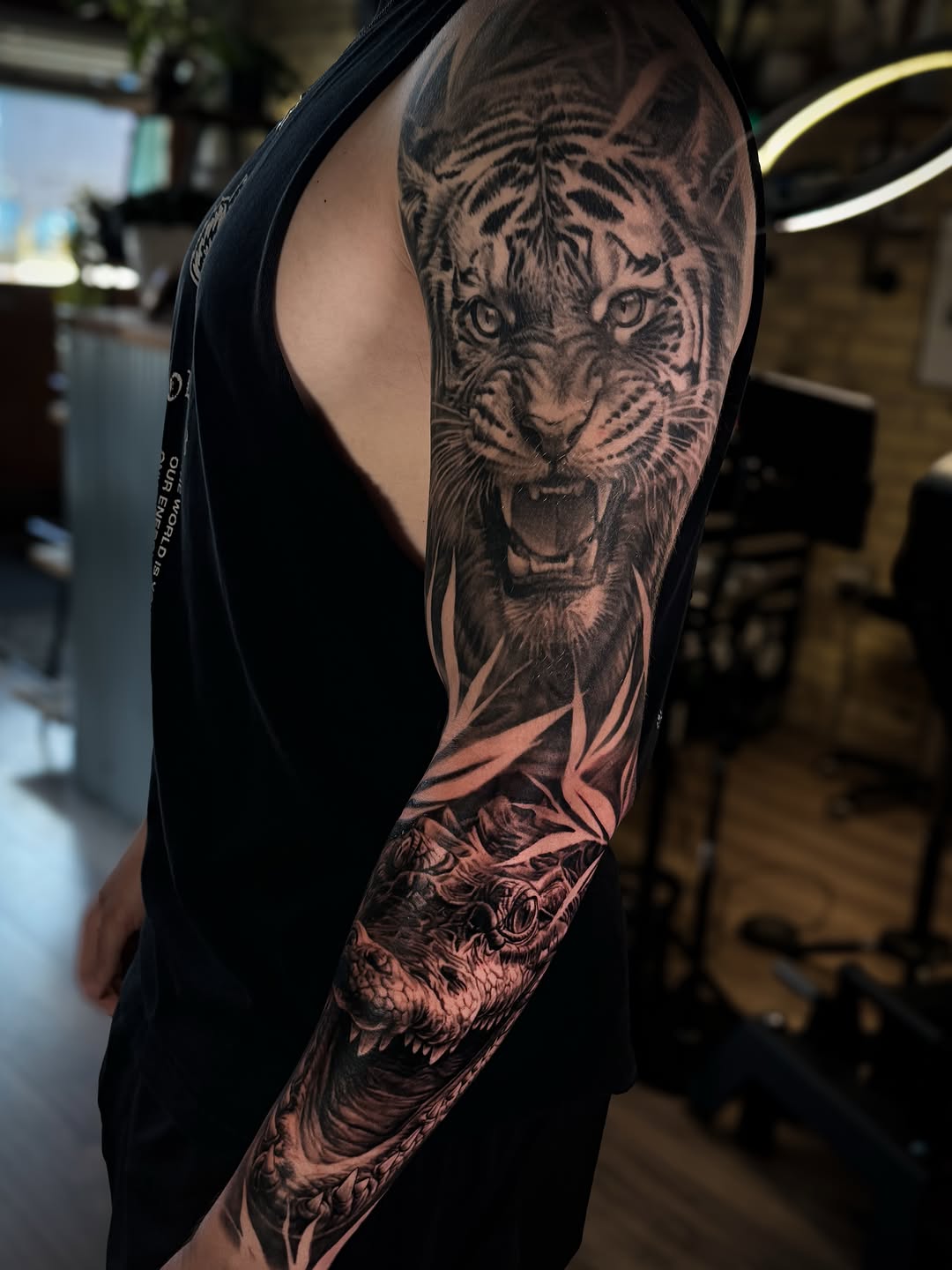 Tattoo by @aaronthomastattoos — realism, black_and_grey