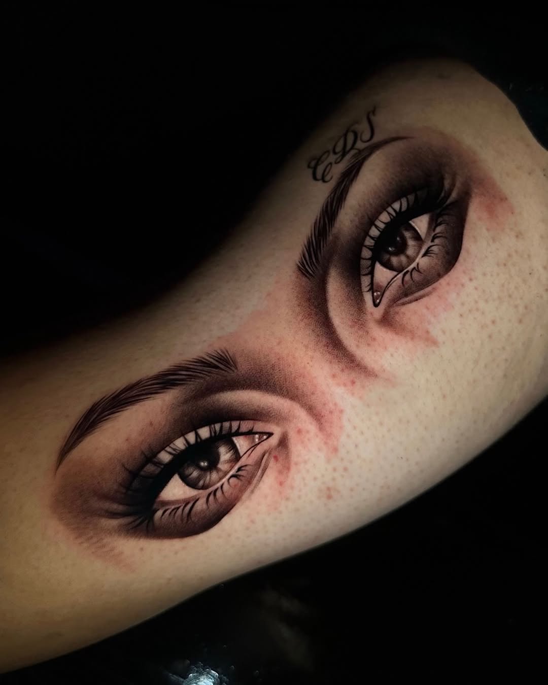 Pair of eyes realism tattoo on the forearm by Emma Sferdian🇷🇴