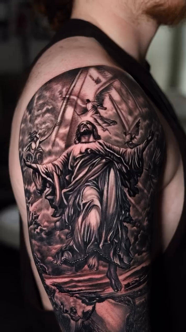 Jesus Christ with crown of thorns realism tattoo on the upper arm by Insight Ink Tattoo