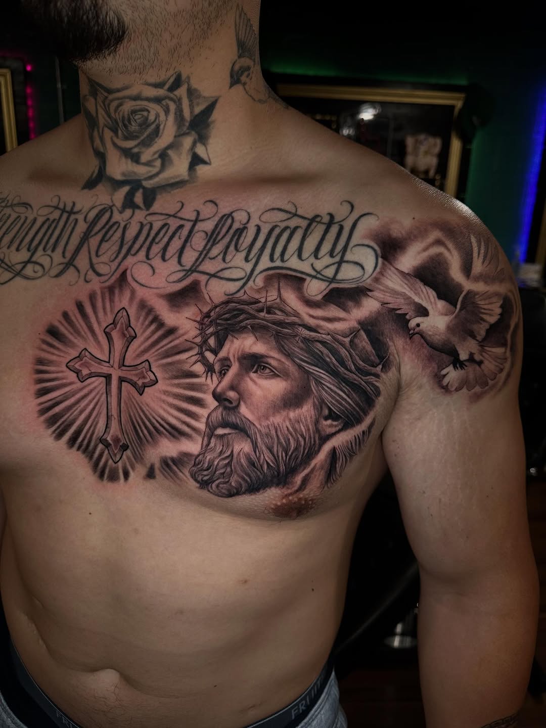 Chicano tattoo on the chest by Mario Flores Tattoo