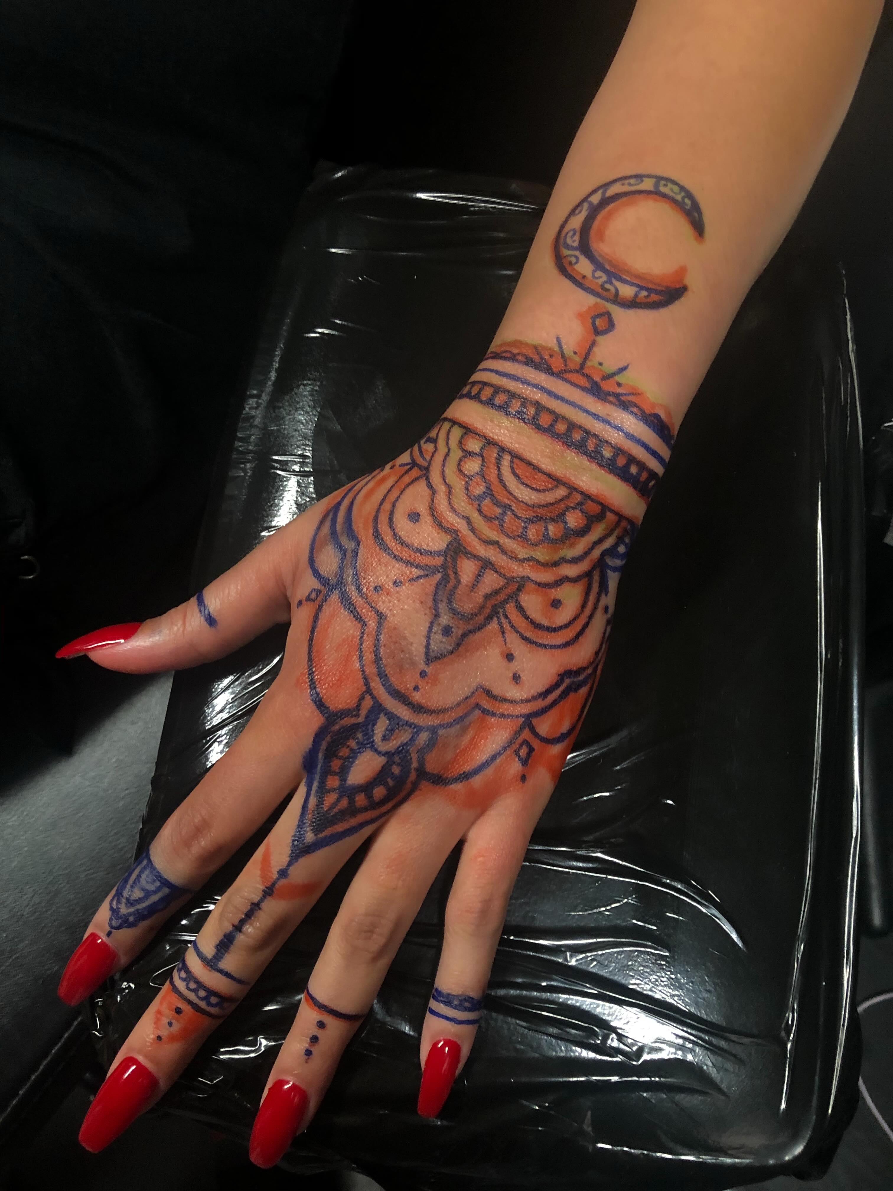 Mandala dotwork tattoo on the hand by Tattoo Artist