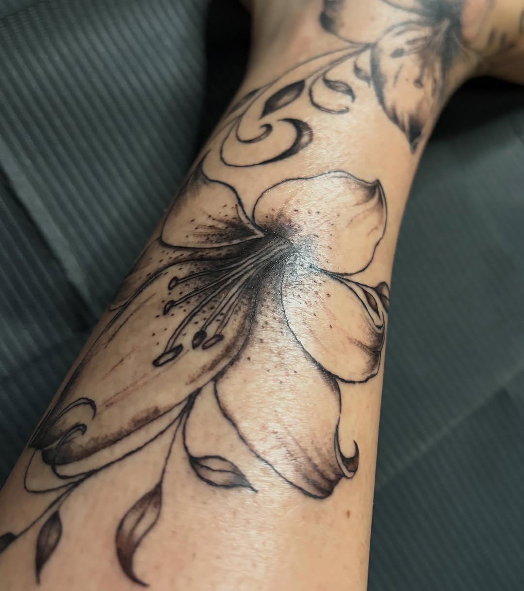 Lily flower with vines fine line tattoo on the forearm by πππ§ ππ’ππ π¨ πππππ¨π¨π¬