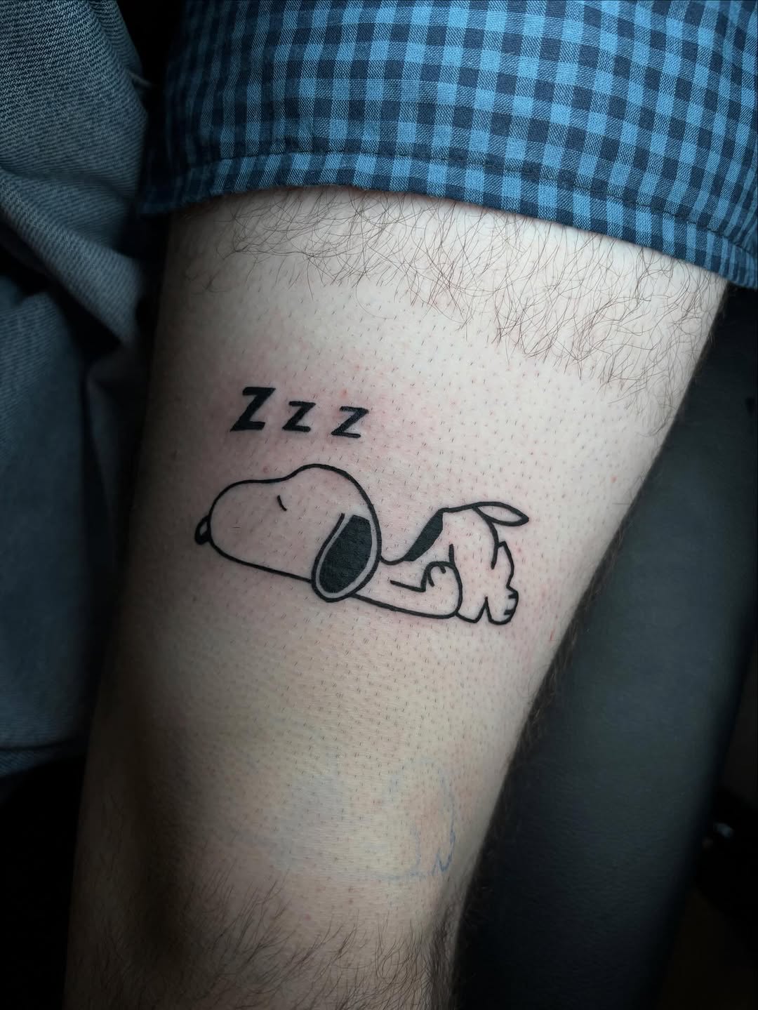 Snoopy sleeping new school tattoo on the forearm by Pres!