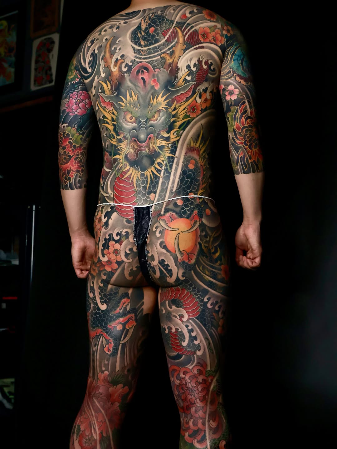 Dragon and chrysanthemum Japanese tattoo on the back by Hocheon