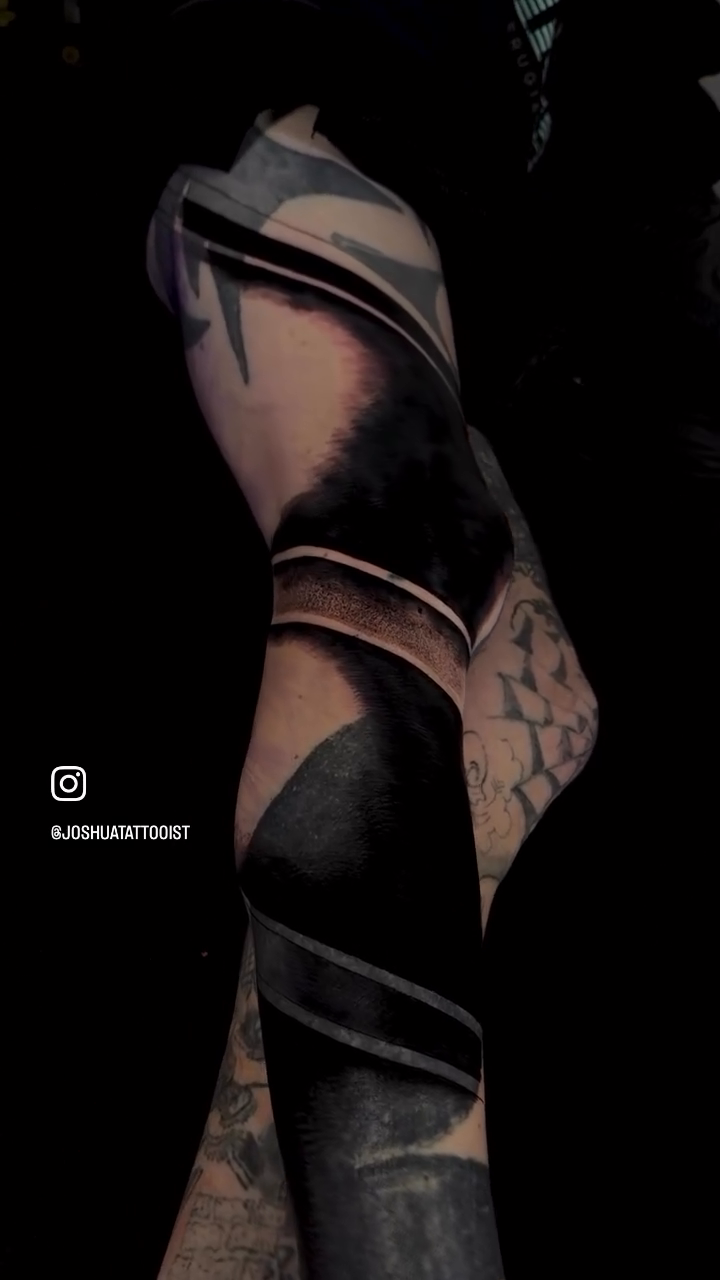 Abstract blackwork sleeve tribal tattoo on the leg by Tattoos By Josh
