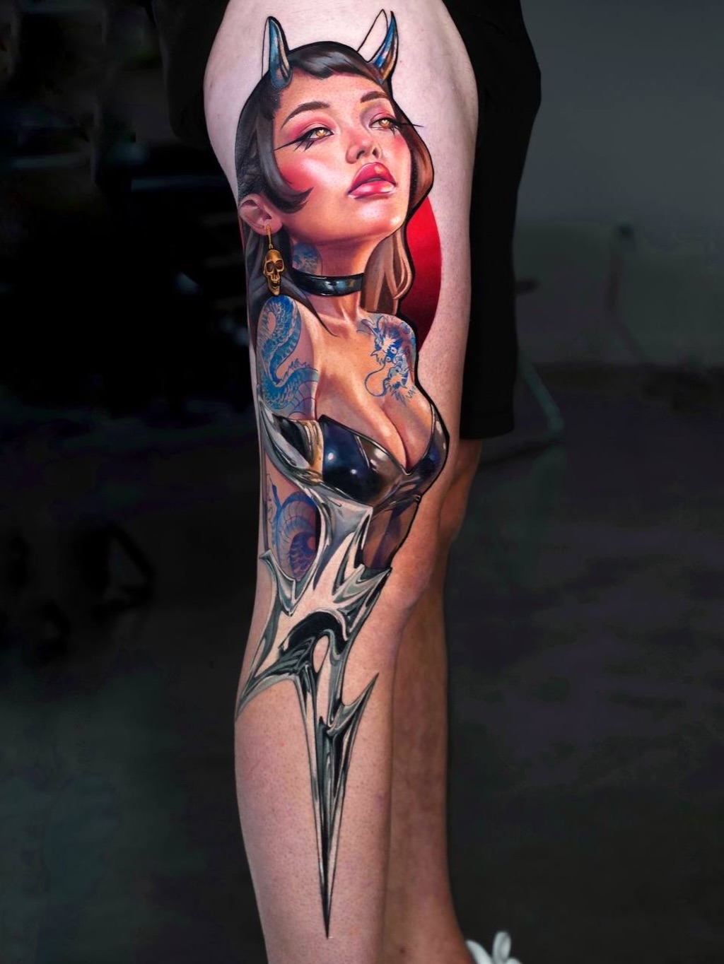 Demon woman with dragon tattoo neo-traditional tattoo on the leg by Daria Pirojenko