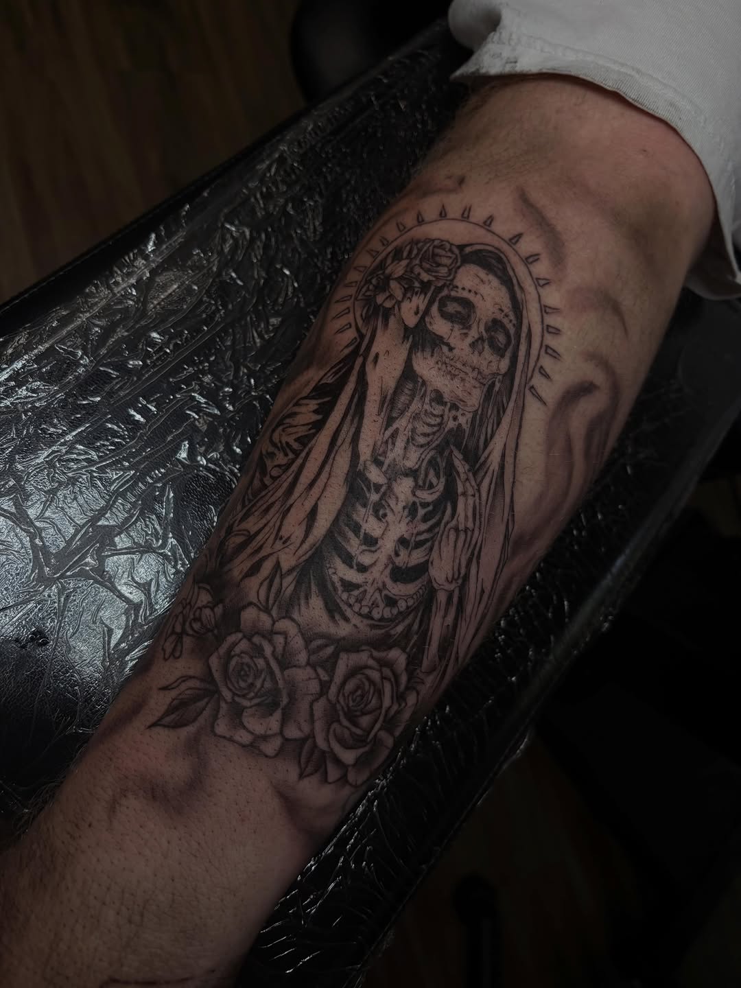 Skeleton woman with roses realism tattoo on the forearm by Cincinnati Tattoo Artist