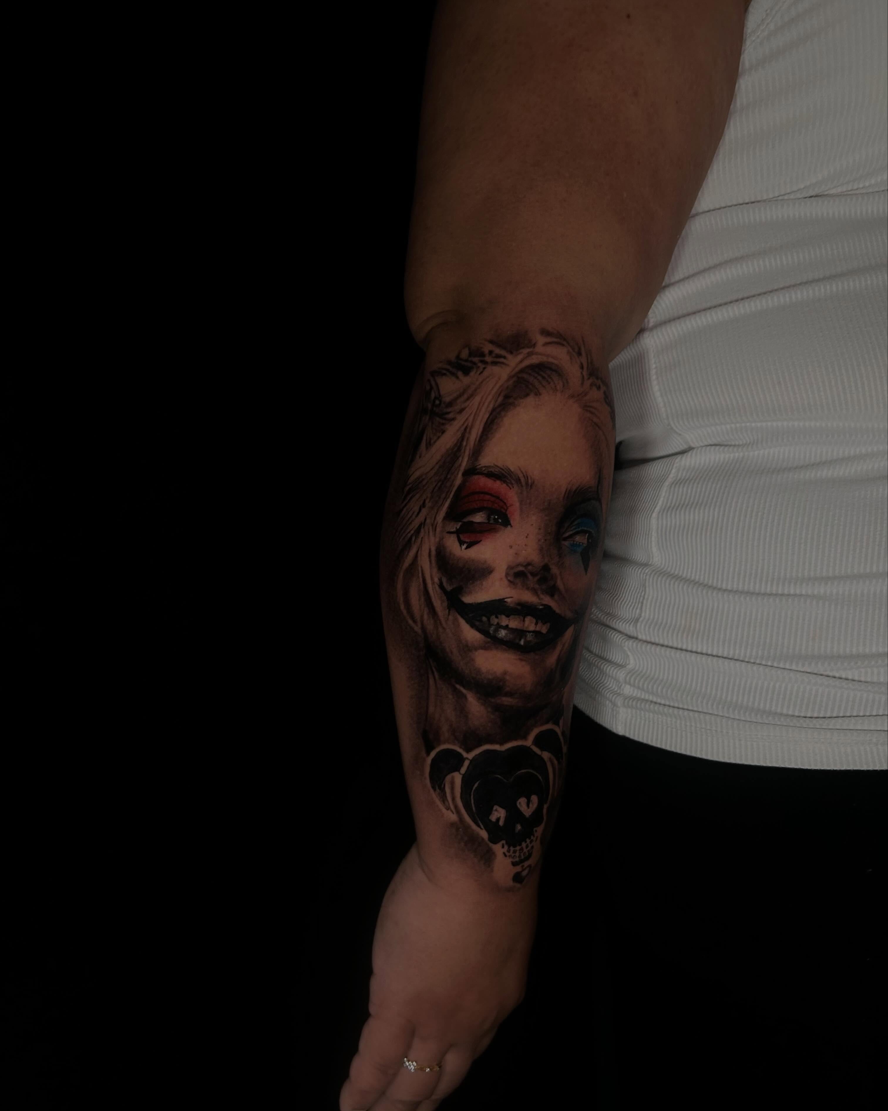 Joker realism tattoo on the forearm by Joey-tattoo Artist