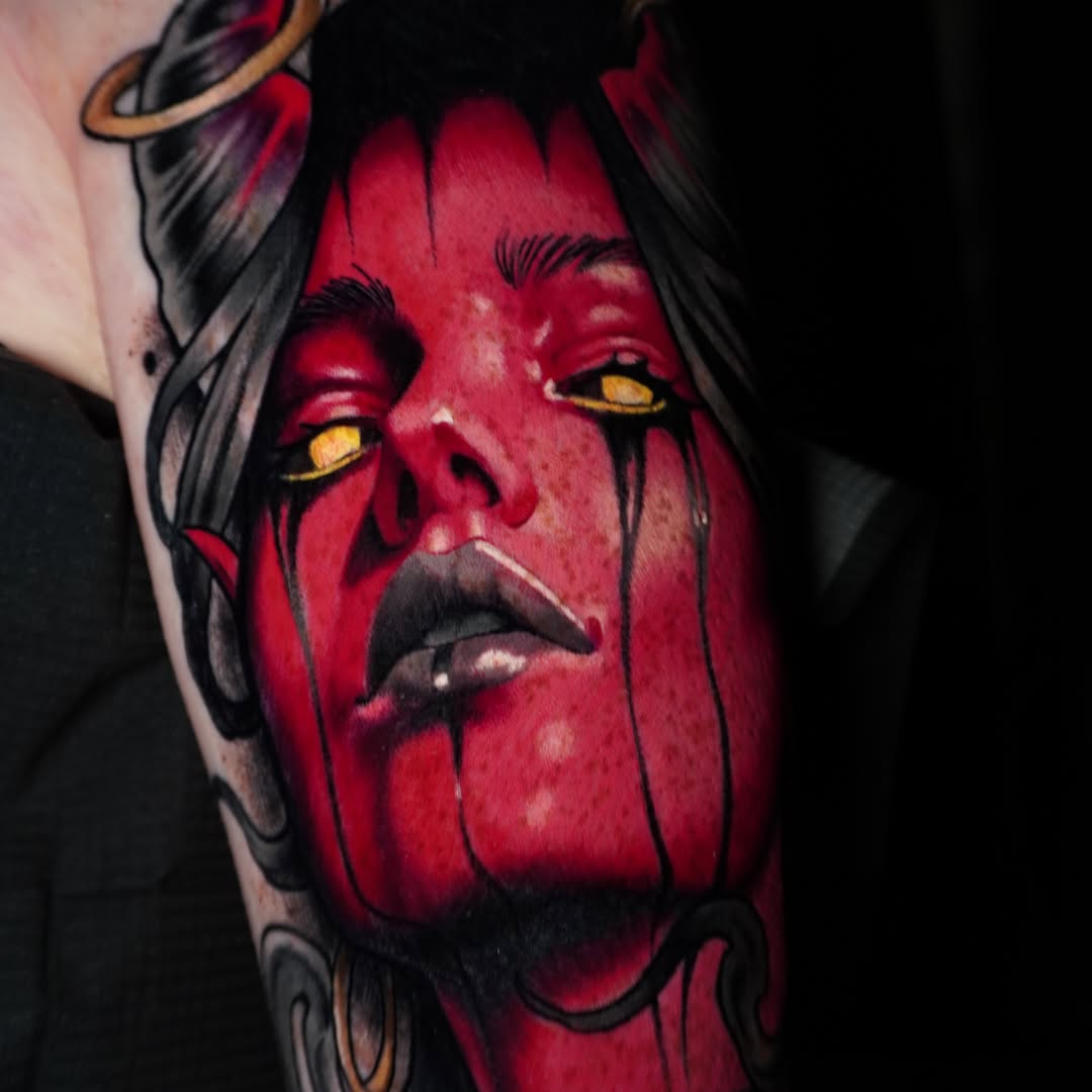 Demonic woman portrait realism tattoo on the forearm by Andrey