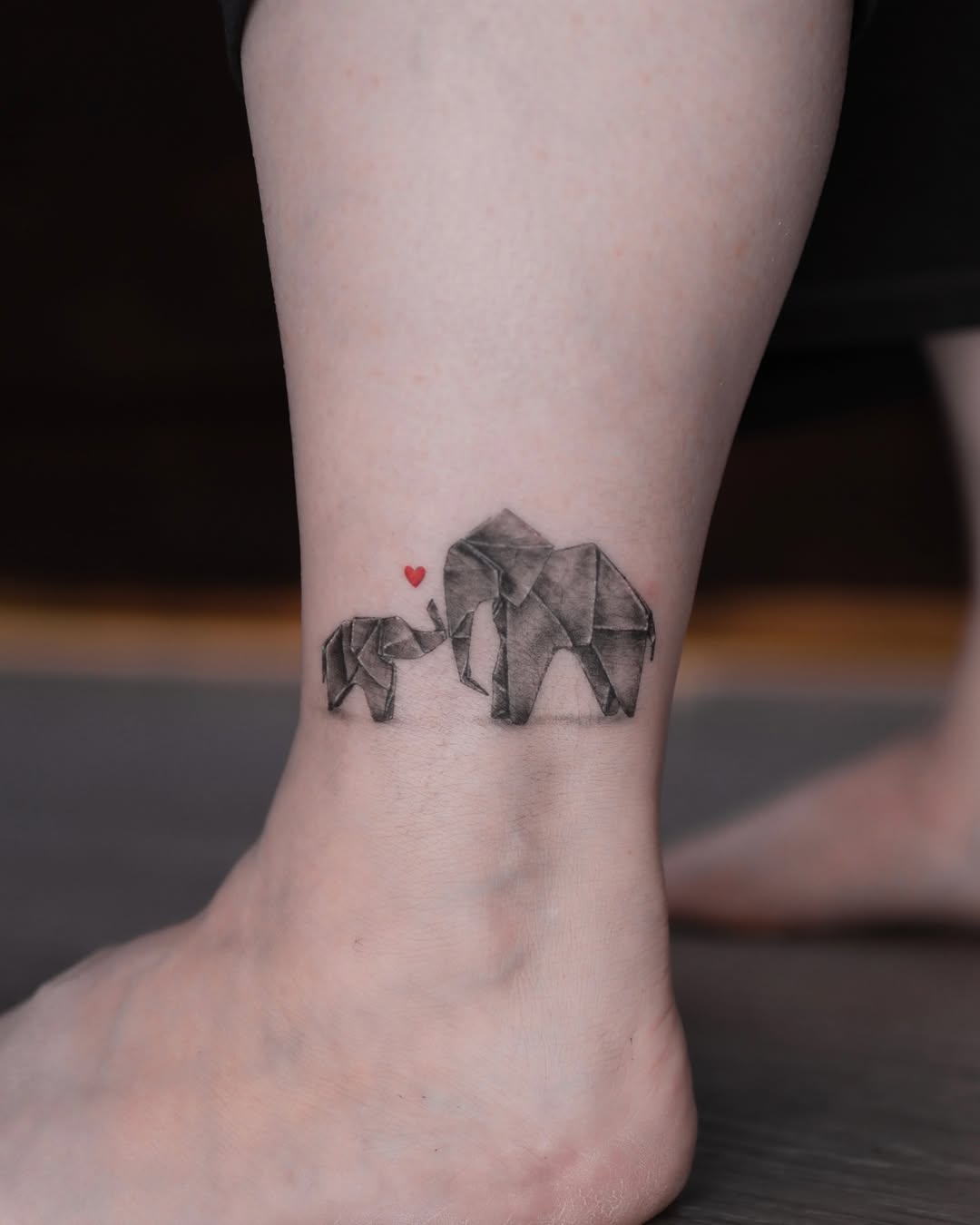 Tattoo by @alinasovina.tattooing — geometric, black_and_grey