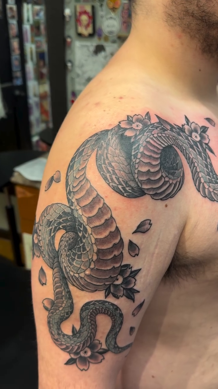 Dragon and flowers tattoo Japanese tattoo on the shoulder by Joe Khay, Hackettstown, New Jersey