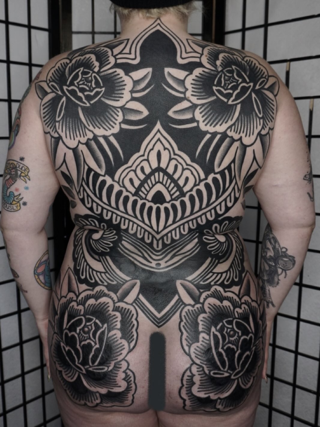 Ornamental floral back piece tribal tattoo on the back by Sarah Christine Tattoo, Calgary, Alberta