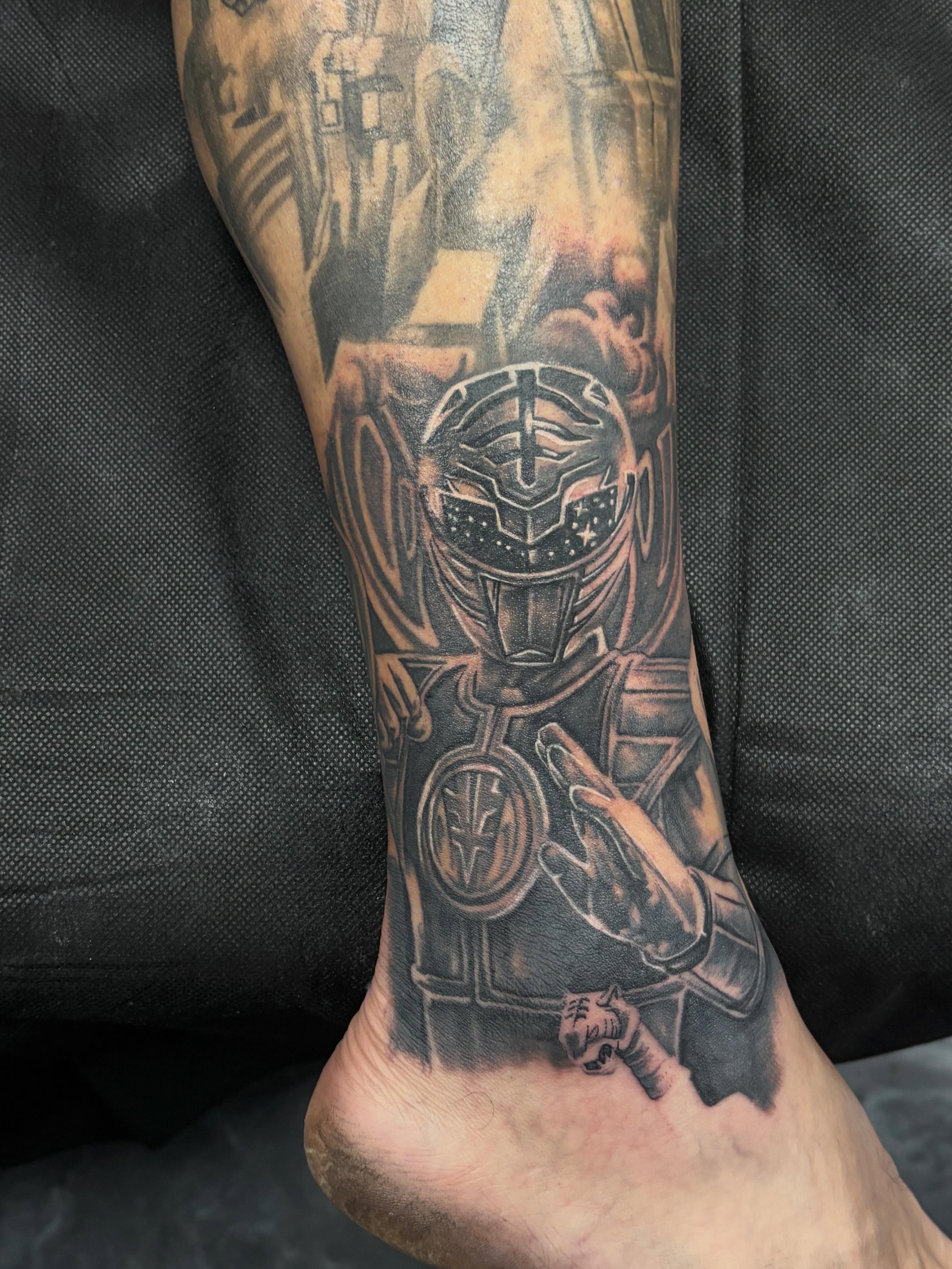 Motorcycle rider realism tattoo on the forearm by Jesus Pubert Munster