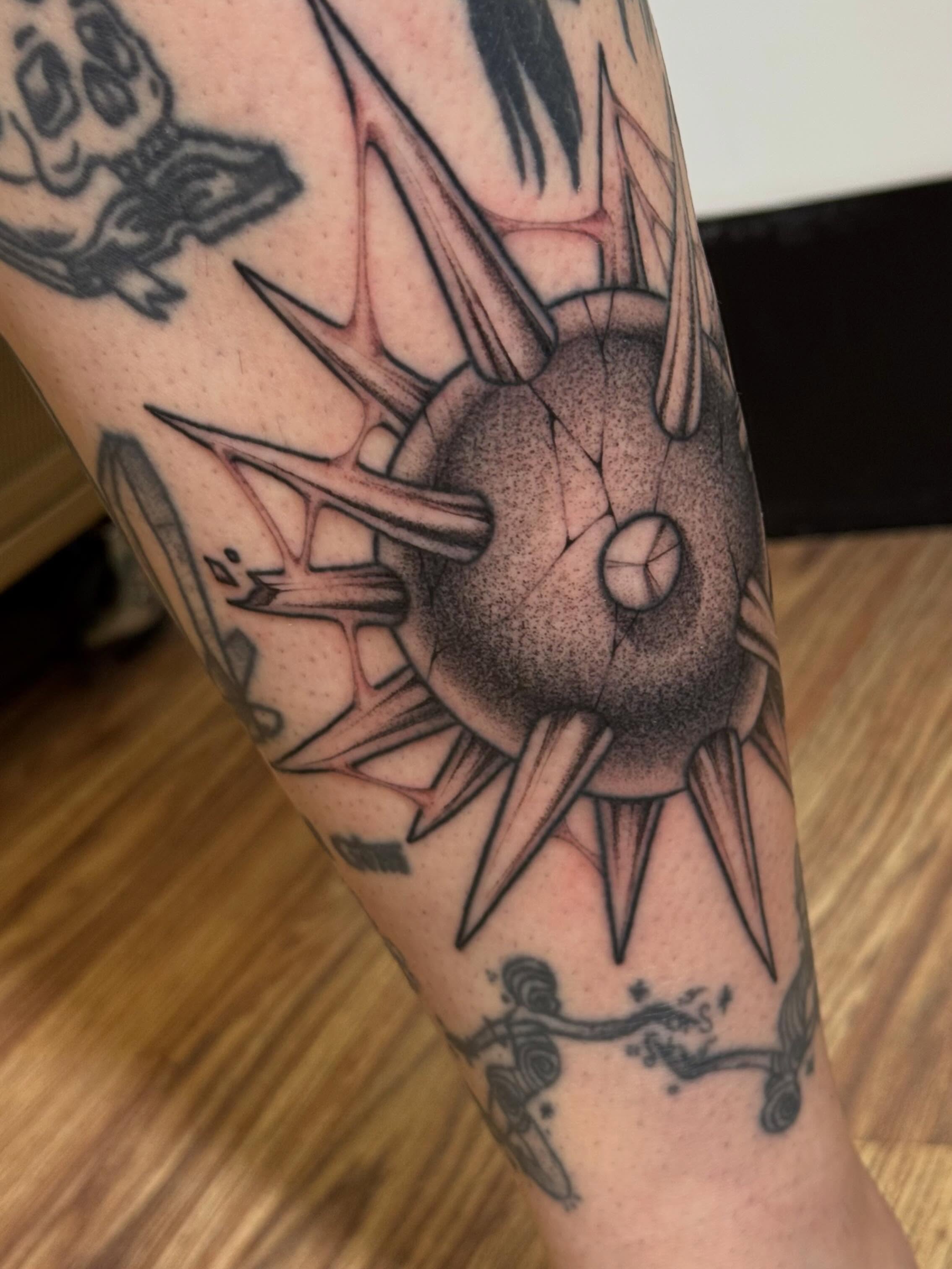 Spiked orb dotwork tattoo on the forearm by Jalisa 🕸️