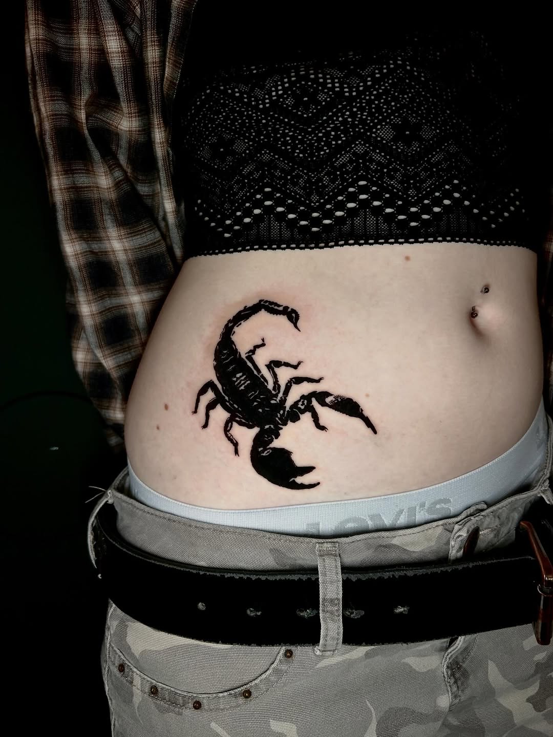 Scorpion fine line tattoo on the torso by KB