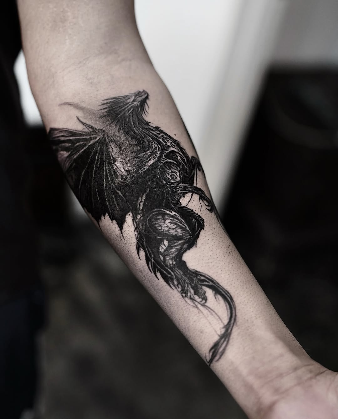 Dragon realism tattoo on the forearm by Gun