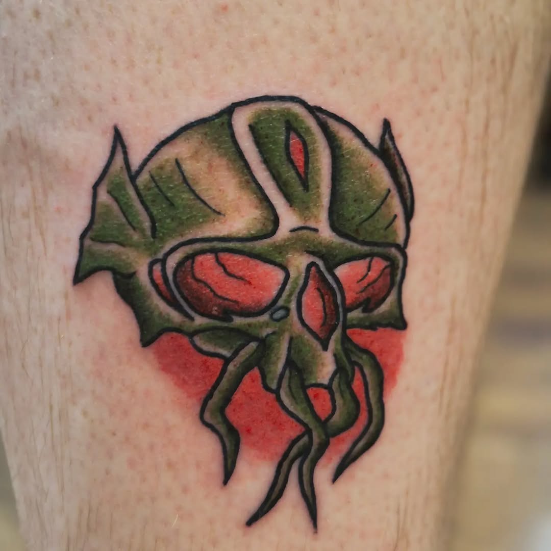 Skull with tentacles American traditional tattoo on the forearm by Bobby H