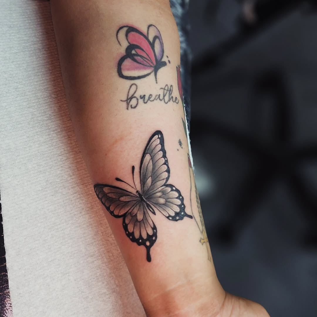 Butterflies and script fine line tattoo on the forearm by Kai_Tattoo