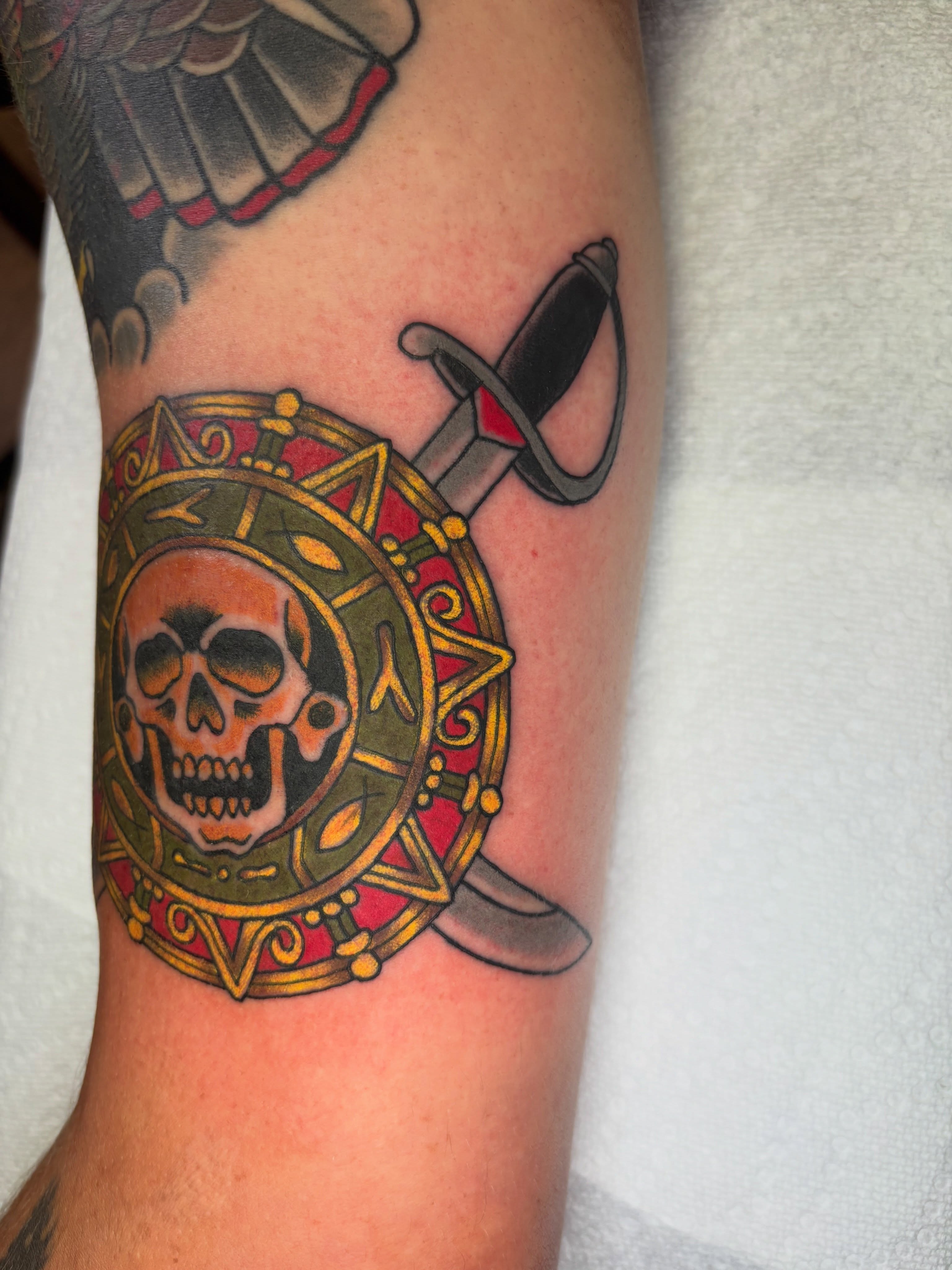Skull and sword American traditional tattoo on the forearm by AARON MASTERS - Tattoo Artist