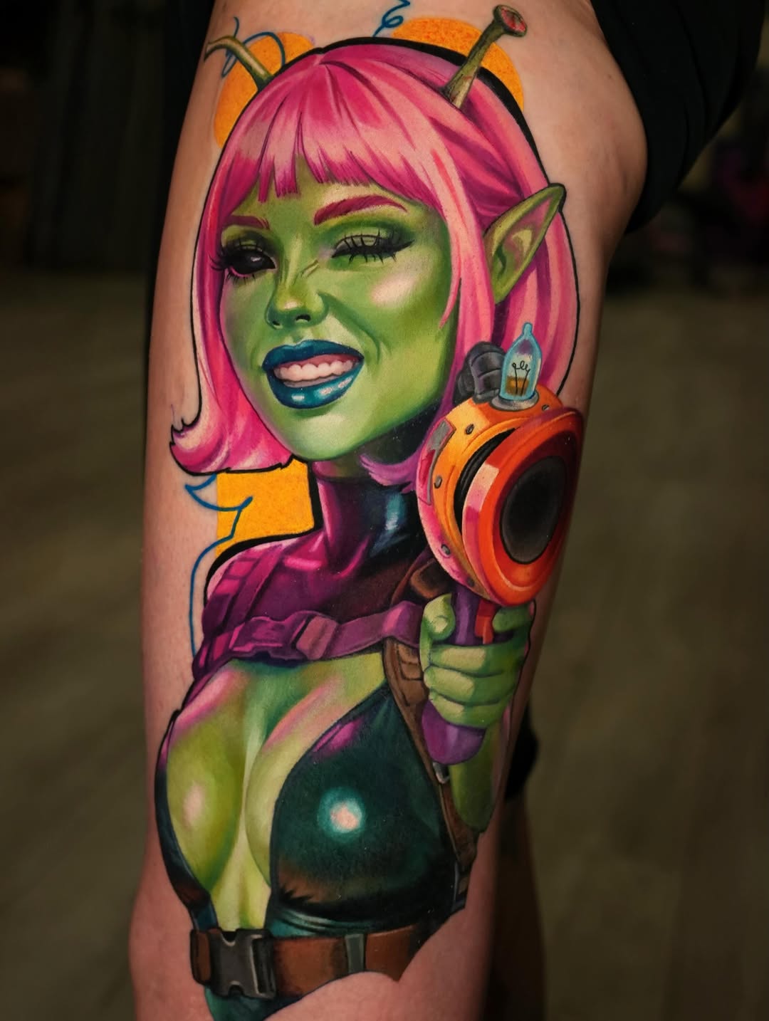 Alien woman with ray gun neo-traditional tattoo on the forearm by Daria Pirojenko