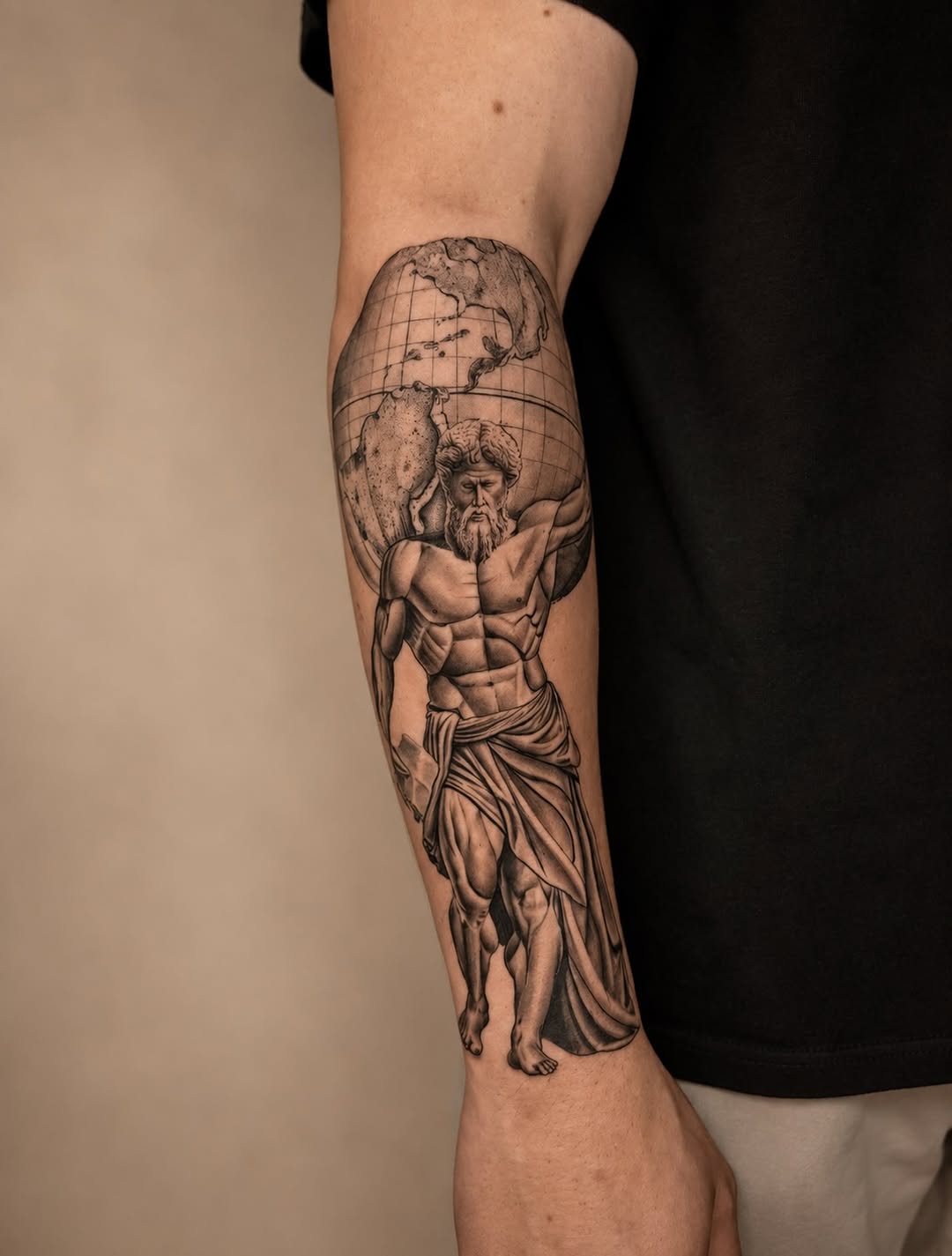 Atlas holding the globe realism tattoo on the forearm by Tiago Britto
