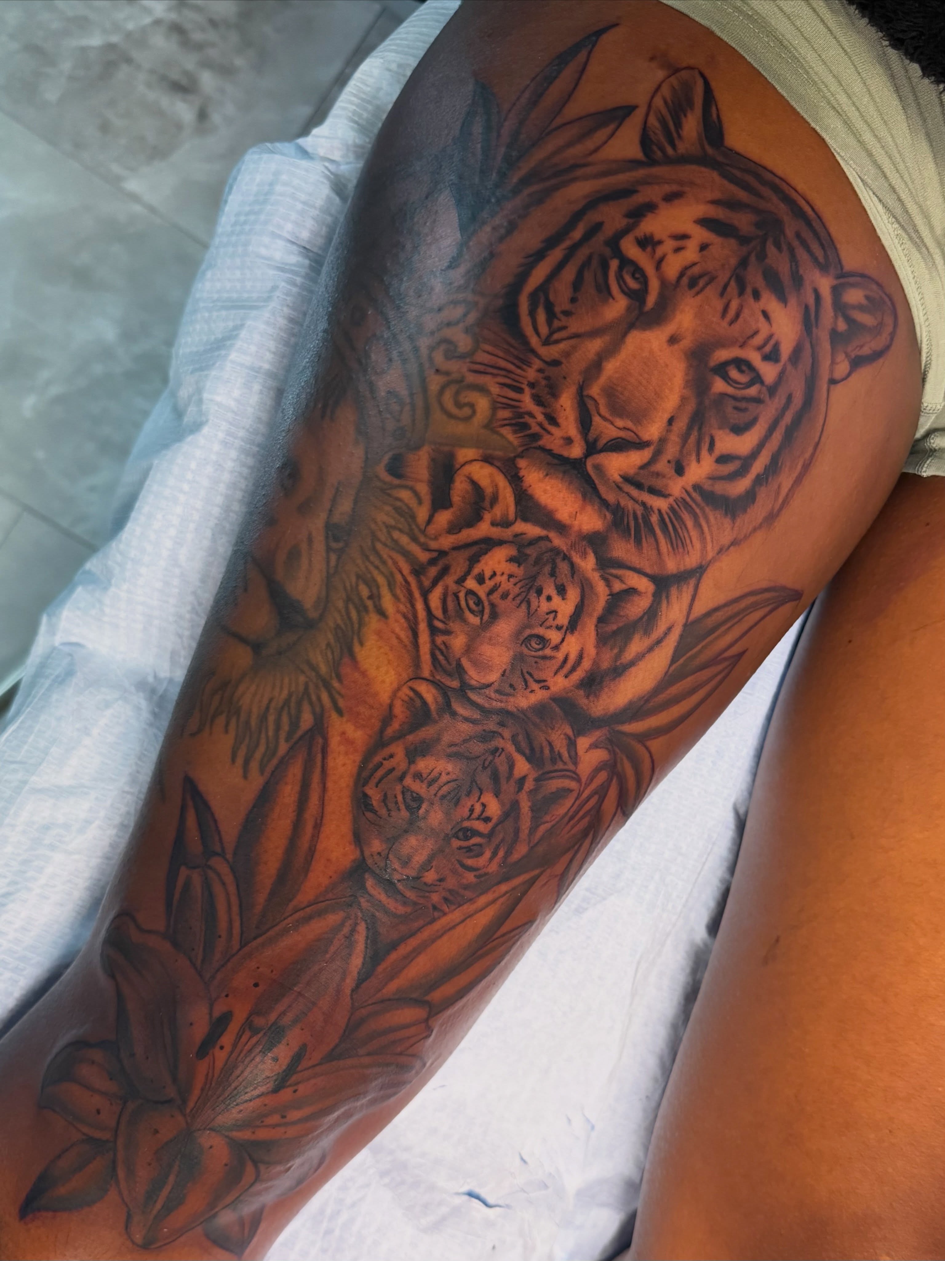 Tattoo by @lizard_aullie_tattoos — realism, black_and_grey