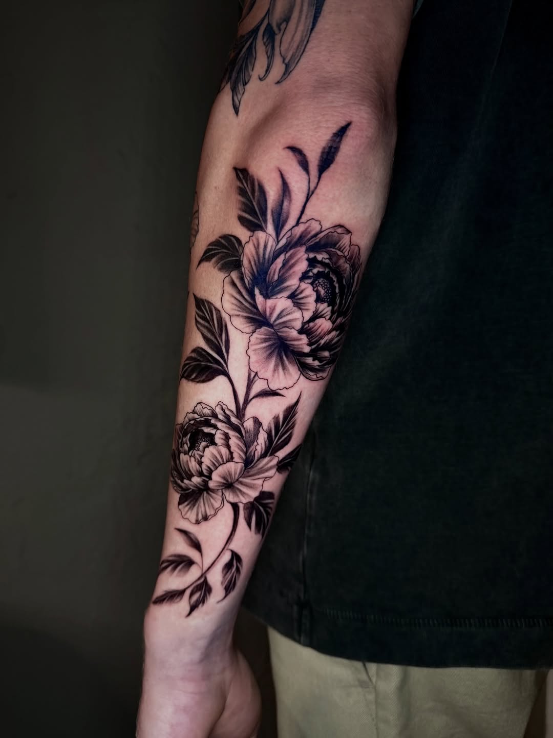 Peonies and leaves fine line tattoo on the forearm by jayla pantig