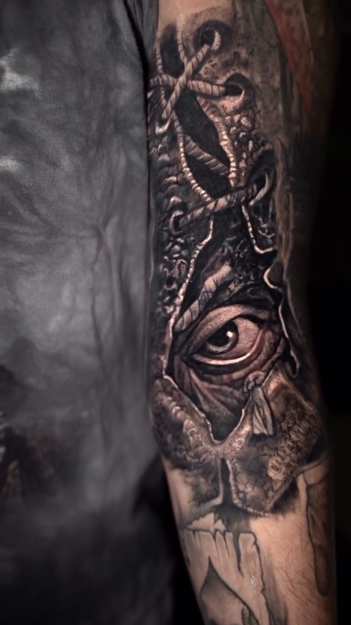 Tattoo by @rrsantander_art — dark_realism, black_and_grey