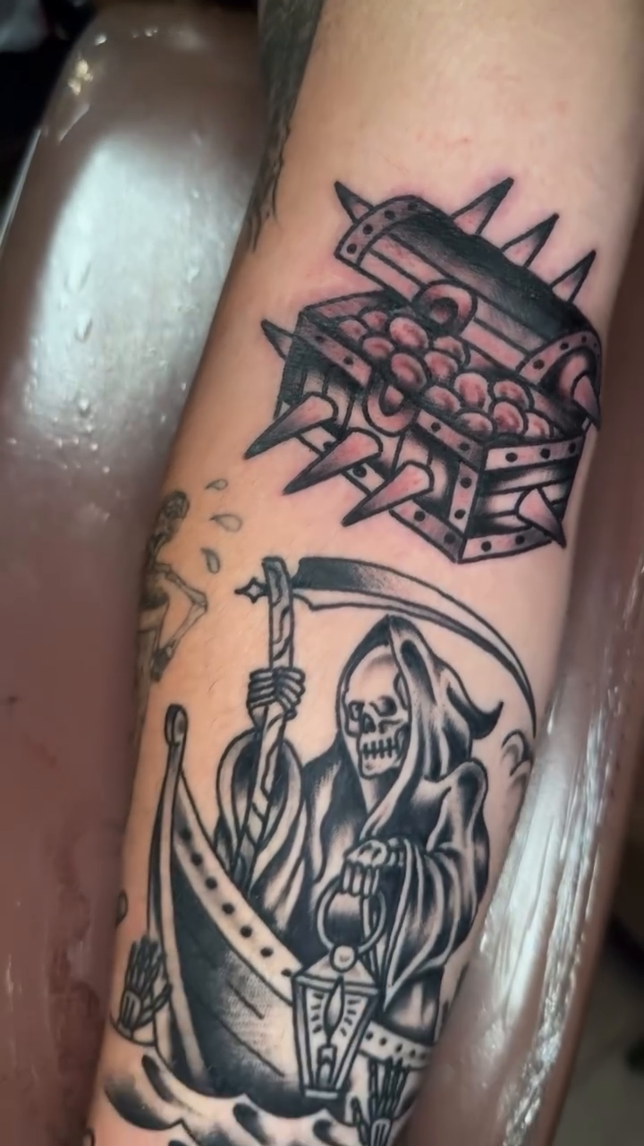 Dark art tattoo on the forearm by Ryan Moraski, Colorado Springs, Colorado